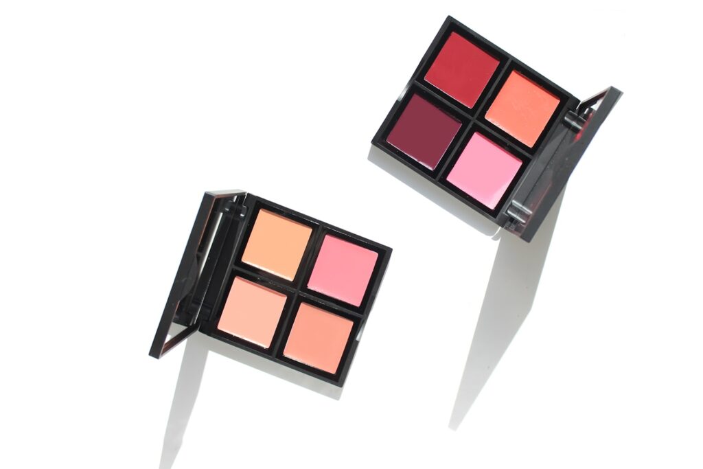 Flatlay of Lipstick and Cream Blush Palettes for use as cosmetics and makeup