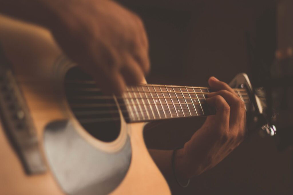 Playing guitar